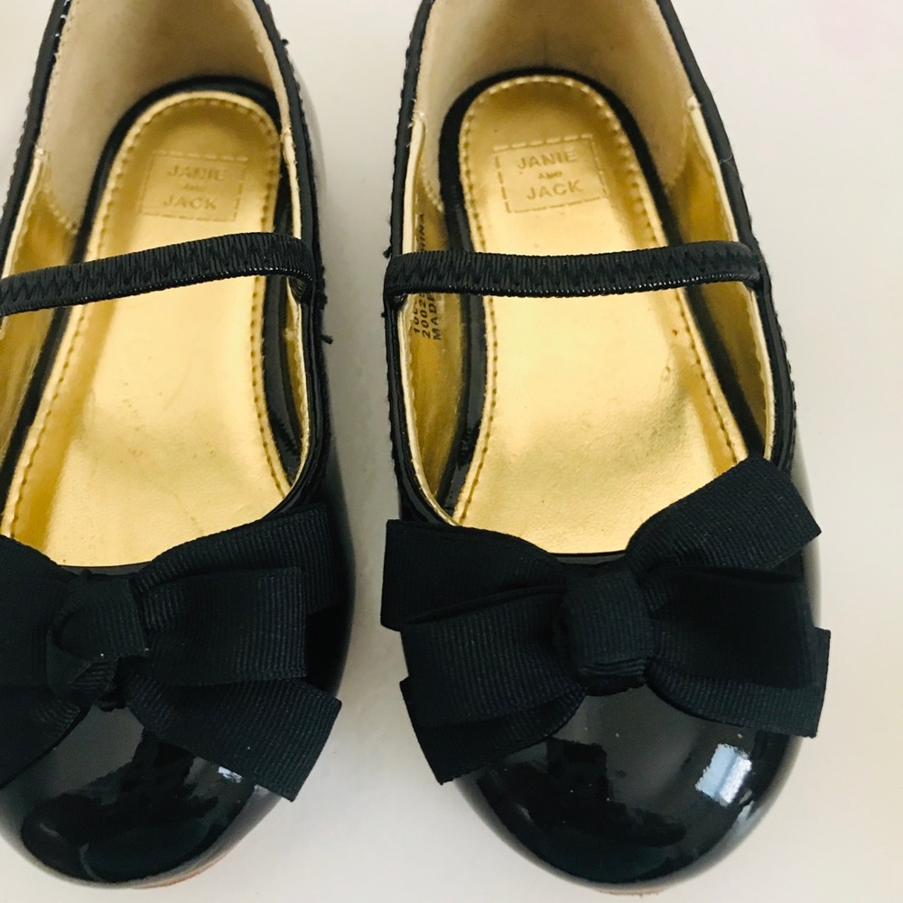 Black patent girl dress shoes with bow